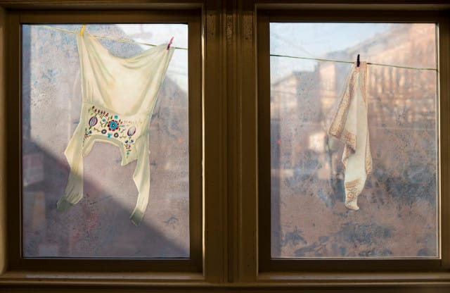 Laura F. Gibellini, "Dom (Variations)" (2013), laminated glass in the Seneca Avenue station