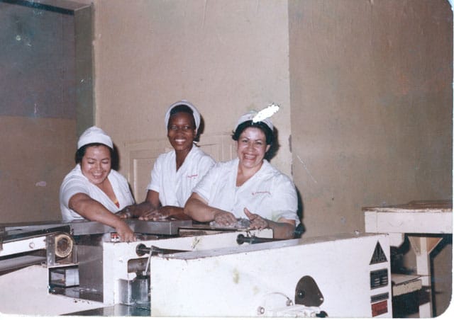 The artist’s mother (center) working at Colombina, La Paila, Colombia, 1988 (photo: collection of Oscar Murillo) (click to enlarge)