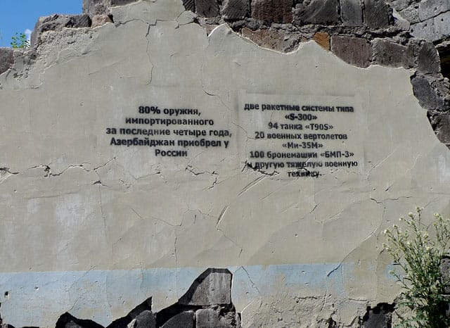 Artlab's stencil proclaiming that 80% of Azerbaijan’s military hardware is bought from Russia