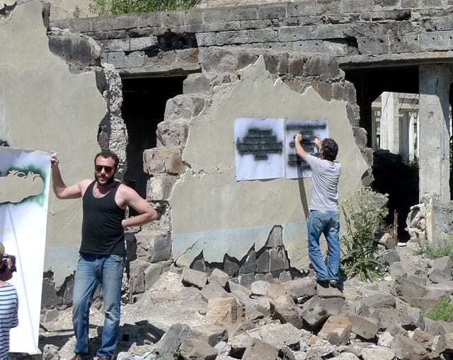 Members of Artlab applying the stencils