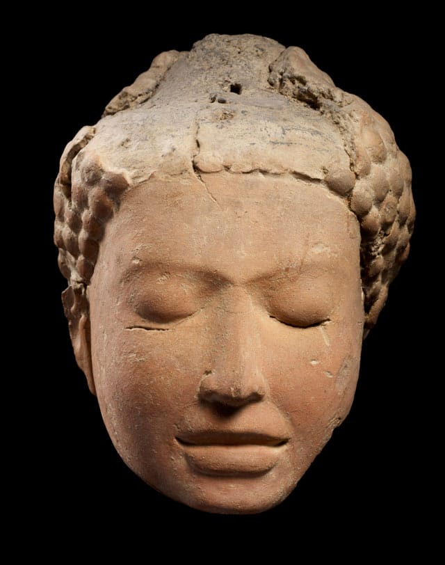 Head of Meditating Buddha, terracotta, H. 6 11/16 in (17 cm), W. 5 7/8 in (15 cm), lent by National Museum, Bangkok (photo by Thierry Ollivier)