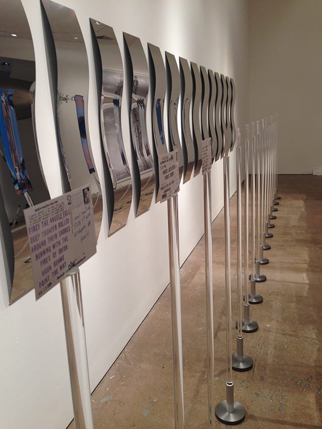 Daniel Joseph Martinez, "She could See Russia from Her House, Those who wish for peace should prepare for war! - Old          Sasquatch Proverb (In search of the Tribe Called Sasquatch, or who really built the Alaskan Oil Pipline) 16 Communiques and found photographs from traveling the length and breadth of Alaska during the month of August, 2009-2010," postcard, mirrors, Plexiglas rods