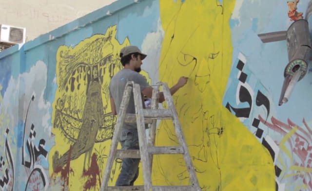 Artist Ganzeer working in Cairo (still via Ganzeer/Vimeo)