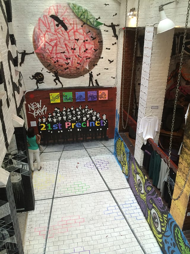 A view of the large first floor space transformed by art.