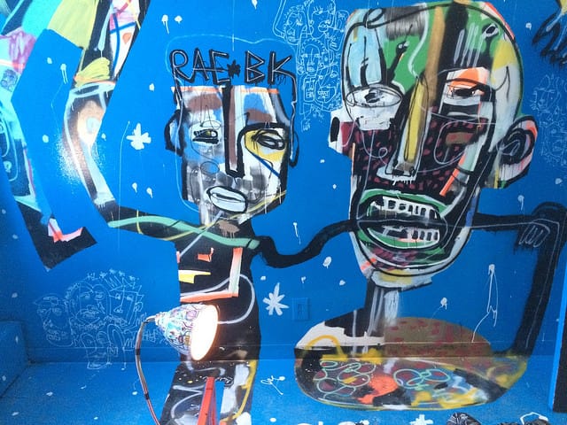 A corner of one of the rooms at 21st Precinct by street artist Rae (photo by the author for Hyperallergic)