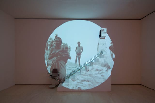 Christoph Schlingensief, "The Stairlift to Heaven," 2007.  Installation view, "Christoph Schlingensief" at MoMA PS1 (photo by Matthew Septimus, courtesy MoMA PS1)