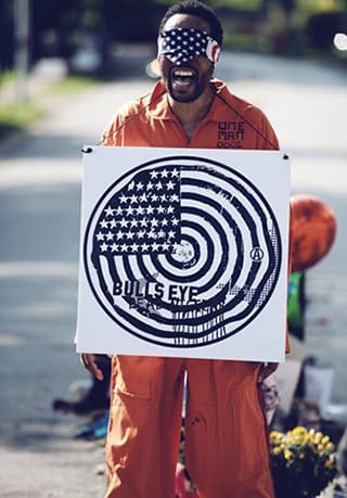 An image from Ferguson, Missouri, from Whitney Hunter and Preach R. Sun's “Body Count: Counting the Dead. #101″ (2014) (photo by Abdul Aziz, courtesy the artist)