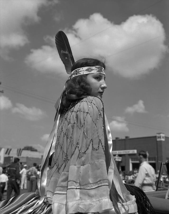 Caption: Eula Mae Narcomey Doonkeen (Seminole) in the American Indian Exposition Parade. Anadarko, Oklahoma, ca. 1952. 45EXCW6