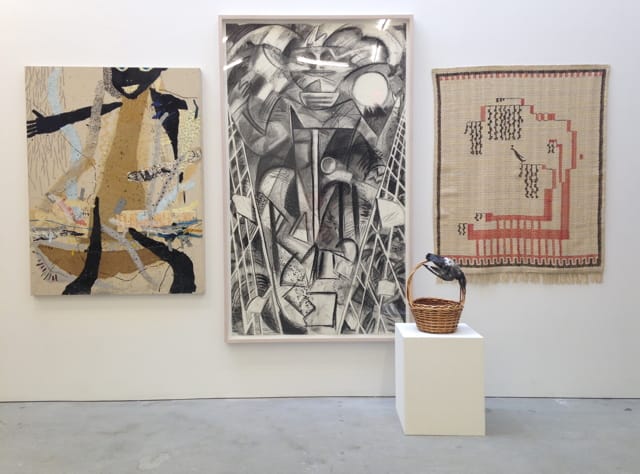 Installation view, 'Another Look at Detroit' at Marlborough Chelsea, with Charles McGee's "Noah's Ark #8" (1984) on left and Loja Saarinen's "Wall Hanging with Peacock" (1932) on right