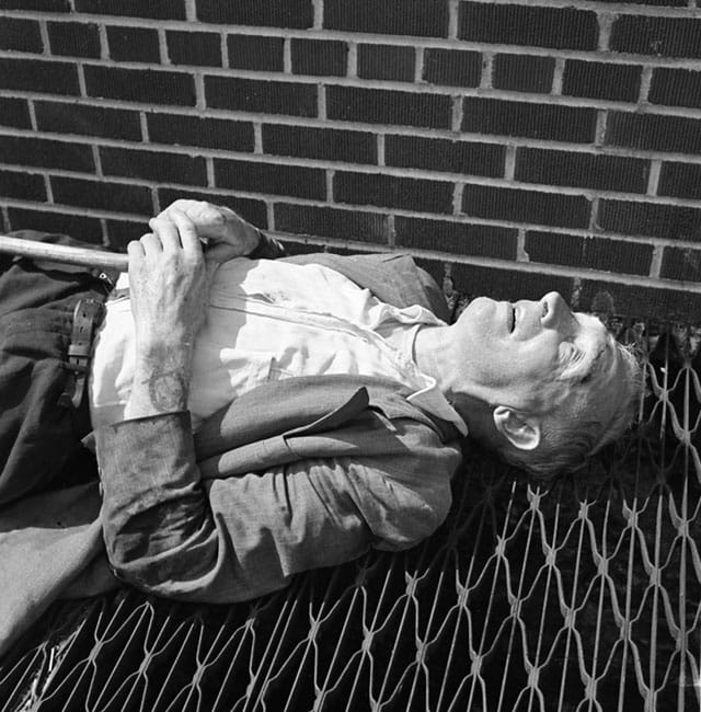 Vivian Maier, "New York (Man Lying on Grate)" (c. 1951–55)