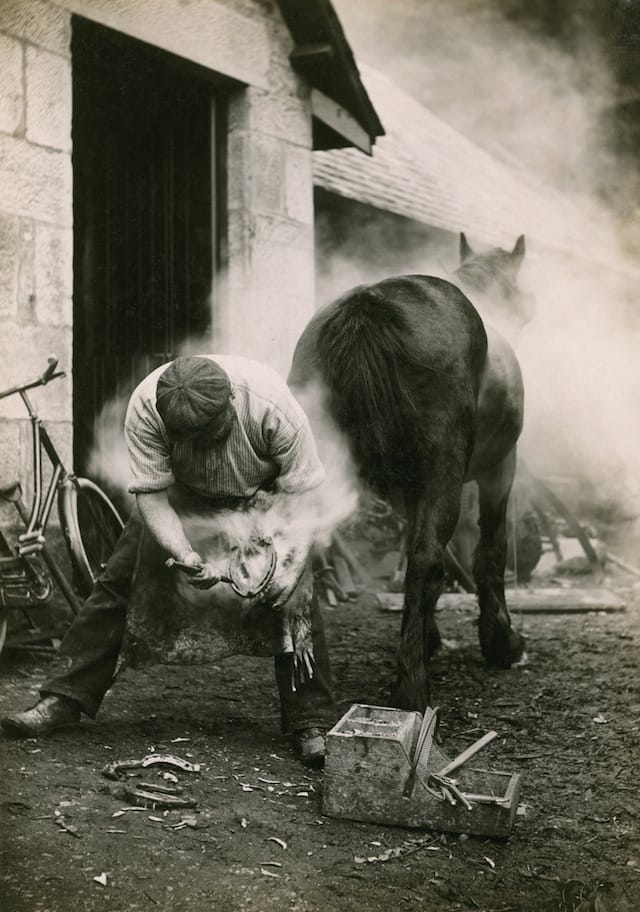 Horseshoeing in Scotland (May 1921) (photograph by William Reid, National Geographic)