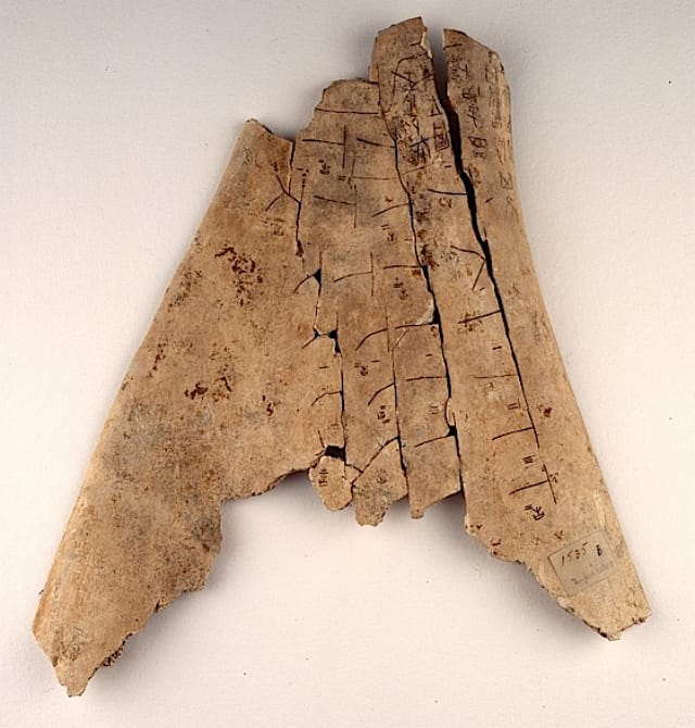 Shang dynasty oracle bone, showing the ├ shaped cracks (via British Library)