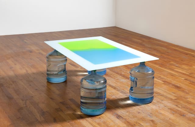 Rationed Water 2013 Hydrophobic coating, tempered glass, water, plastic bottles, fierce apple Gatorade, blueberry-pomegranate Gatorade 58 1/2 x 33 1/2 x 20