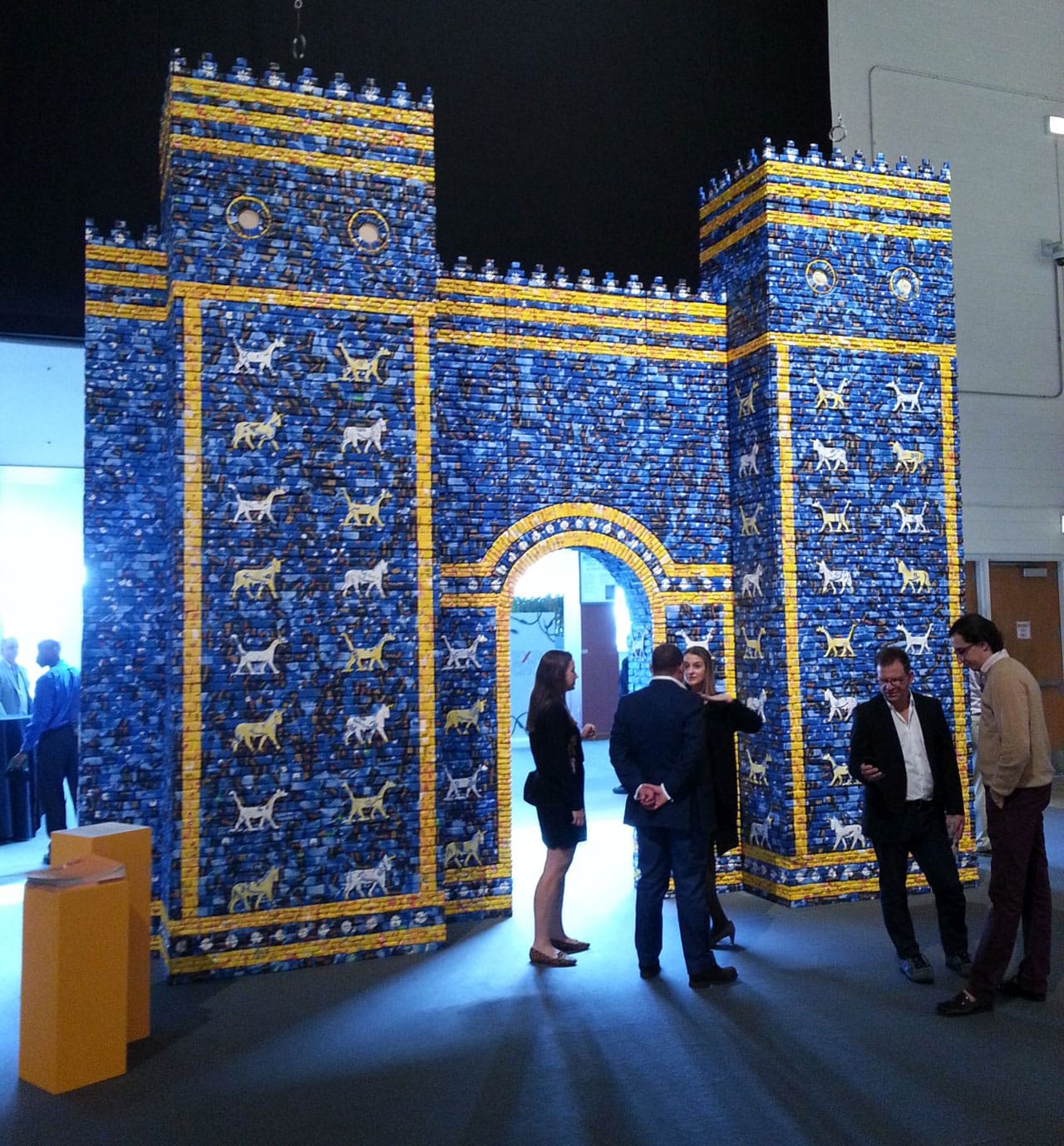 Michael Rakowitz, "May the Arrogant Not Prevail" (2010), found Arabic packaging and newspapers, card, wood, glue, 19’ 7” x 16’ 2” x 3’ 2”