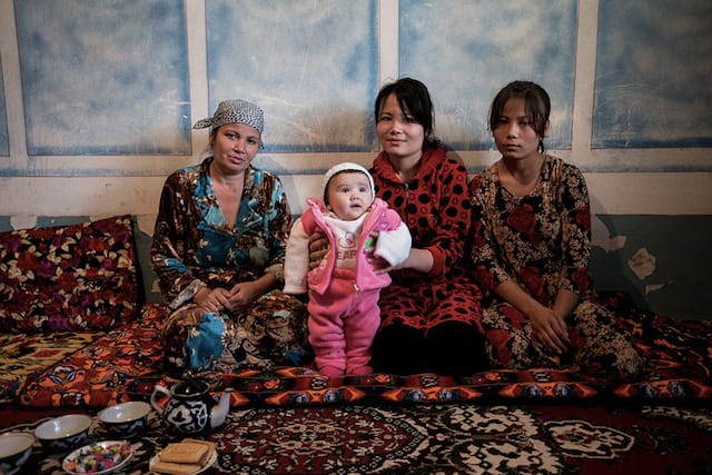 The family of a deceased migrant worker in Bukhara, Uzbekistan. 