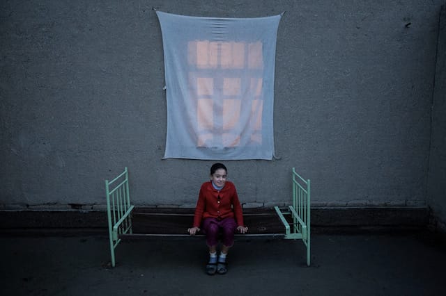 A 12 year-old-girl in Uzbekistan. Many parents leave their children with their elder daughters while they are working in Russia themselves.