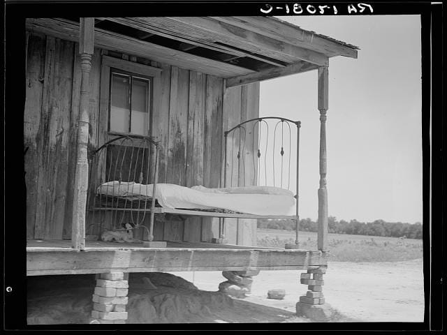 Bed on the porch, Newport, Oklahoma, photograph by Dorothea Lange (June 1937) (via Photogrammar/Library of Congress)