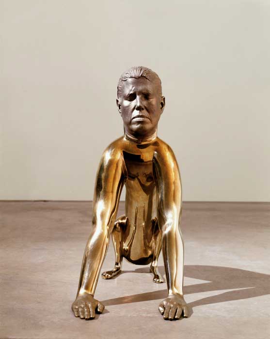 Rona Podnick, "Dog" (1998–2001), yellow stainless steel, 28 x 16.5 x 32 inches