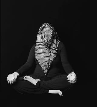 Roya Falahi, "Headbang/Holding Space", 2011 Silver gelatin print, 11x14 in. (via vincentpriceartmuseum.org)