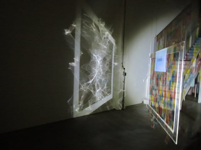 Jennifer West, 'Flashlight Filmstrip Projections' (2014) (photo by the author for Hyperallergic) 