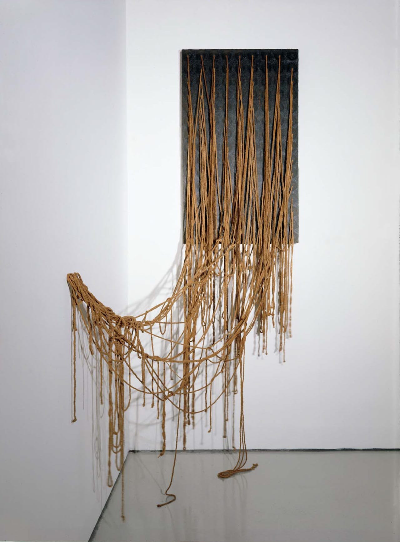 Eva Hesse Ennead, 1966 Acrylic, papier mâché, plastic, plywood, and string 96 x 39 x 17 inches 244 x 99 x 43 cm Collection of Barbara Lee, Cambridge, Massachusetts Photo by Abby Robinson, New York ©The Estate of Eva Hesse, courtesy of Hauser & Wirth