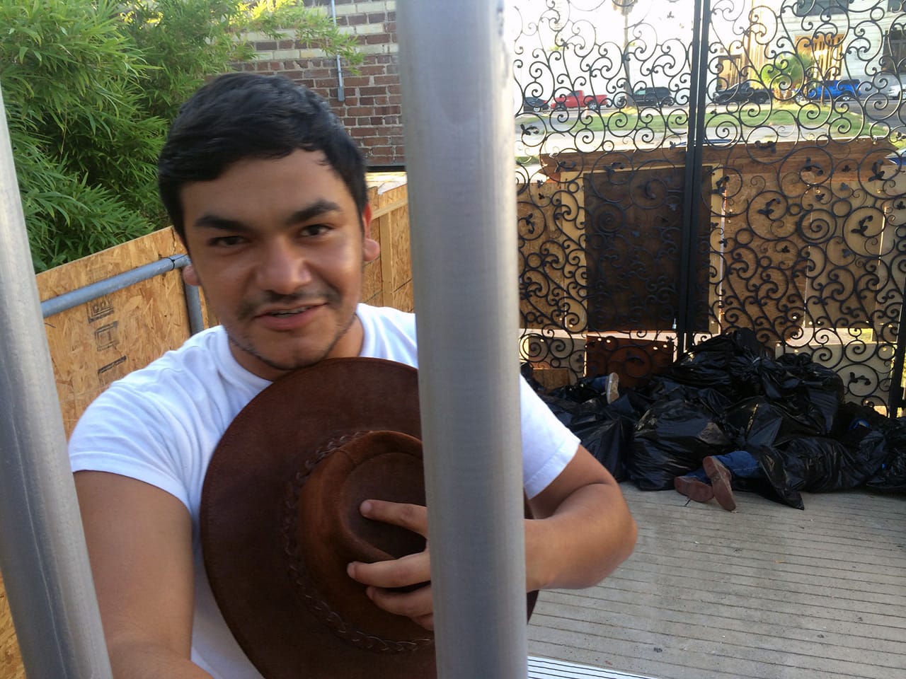 A happy inmate with bodies stashed in the back.