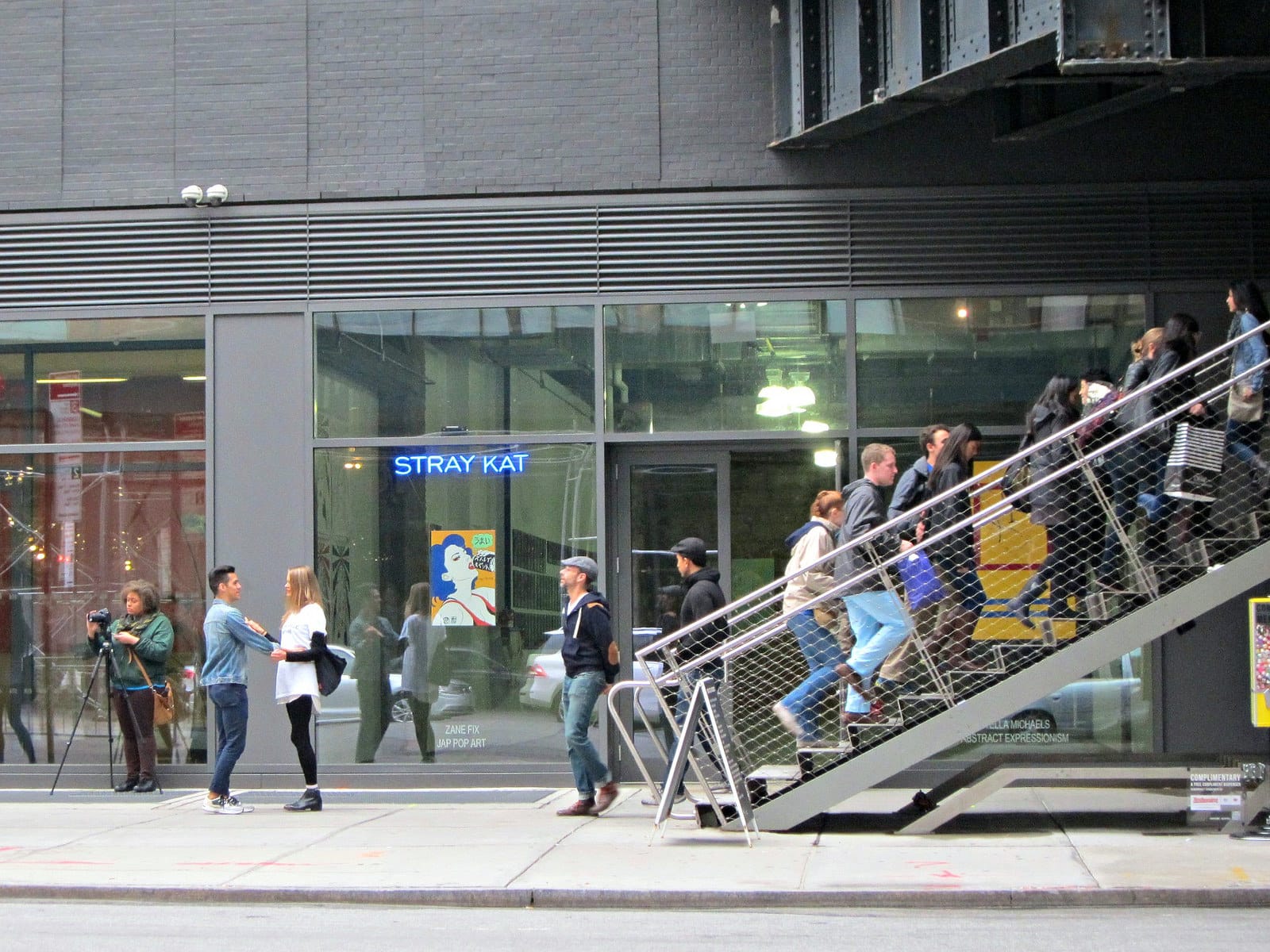 Katya Grokhovsky's "Slow Dance," with passersby invited to slow dance on the street, at left alongside the High Line entrance