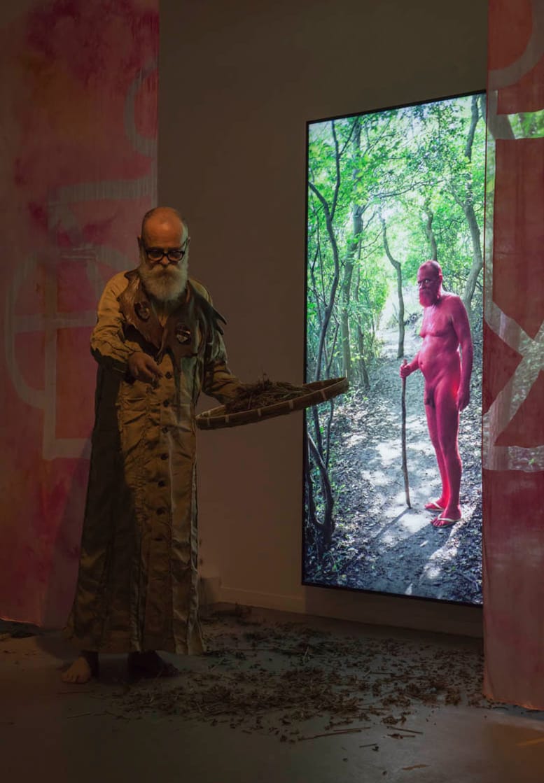 AA Bronson performs “Artemesia for my Great Gandfather” (2014), spreading mugwort of the first two floors of the pagoda. Costume by Mark Jan Krayenhoff van de Leur. (all photos by Stefan Altenburger, 2014,  courtesy of Esther Schipper, Berlin, and Maureen Paley, London)