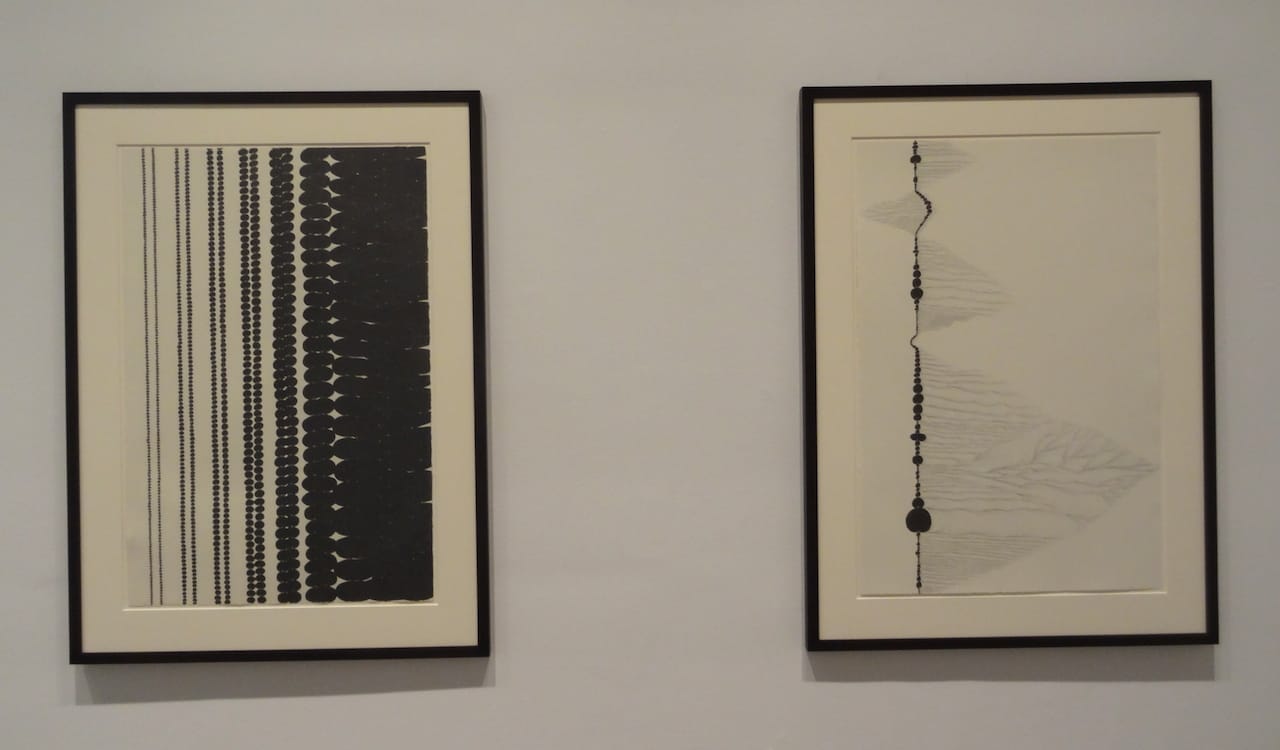 Installation view of 'Chris Ofili: Night and Day' with "Afro Margin Eight" (2007, at left) and "Afro Margin Two" (2004, at right)