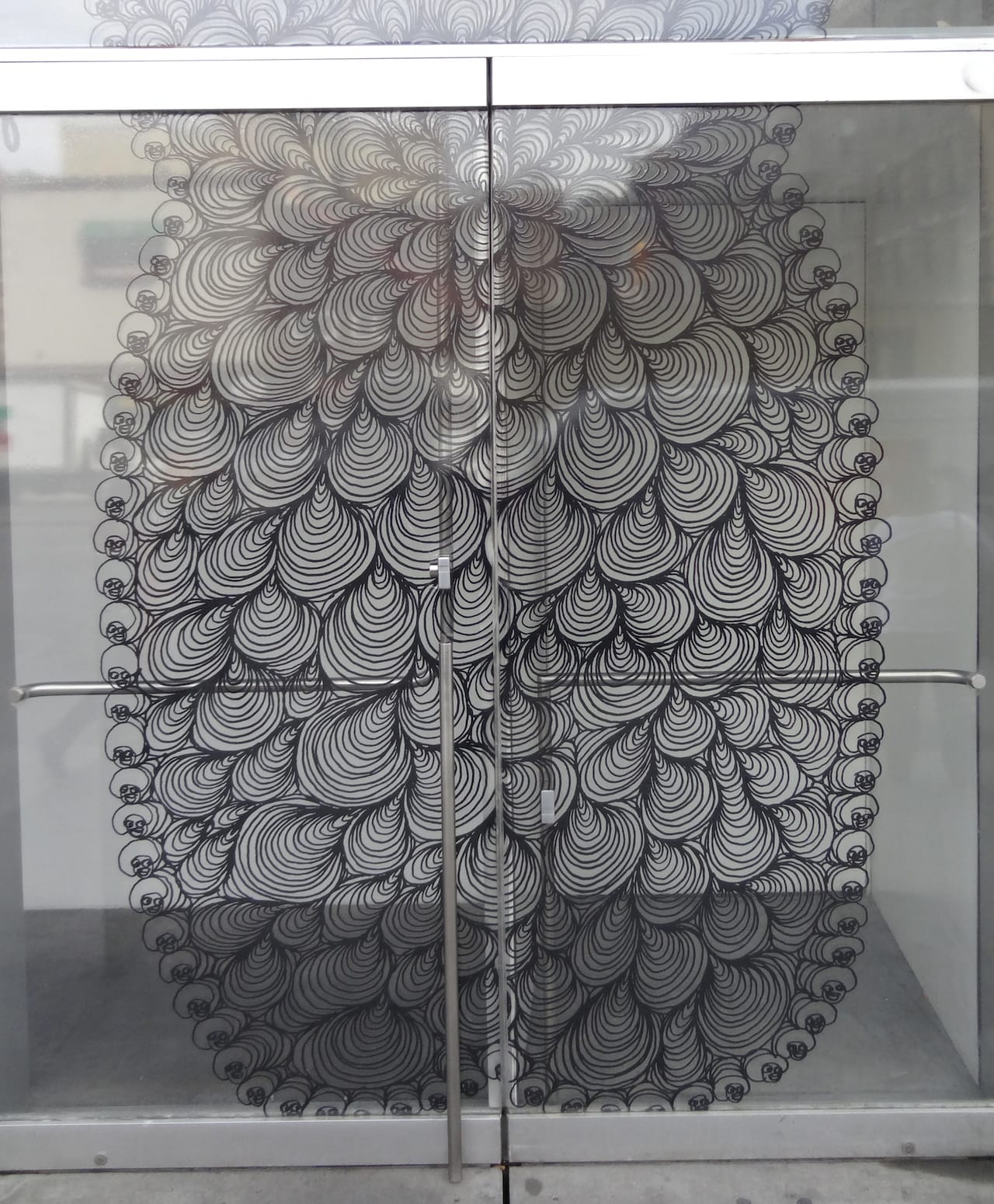 Chris Ofili, "Afro Waves" (2002–03) on the exterior of the New Museum lobby