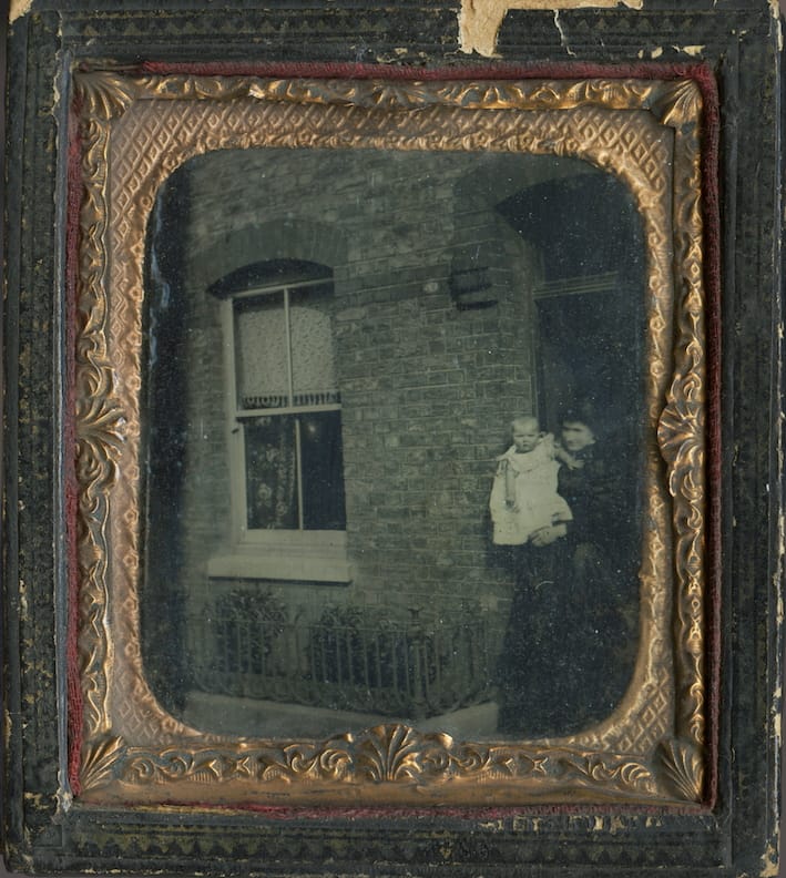 Anonymous portrait of a woman and child outside house (c. 1885), ambrotype