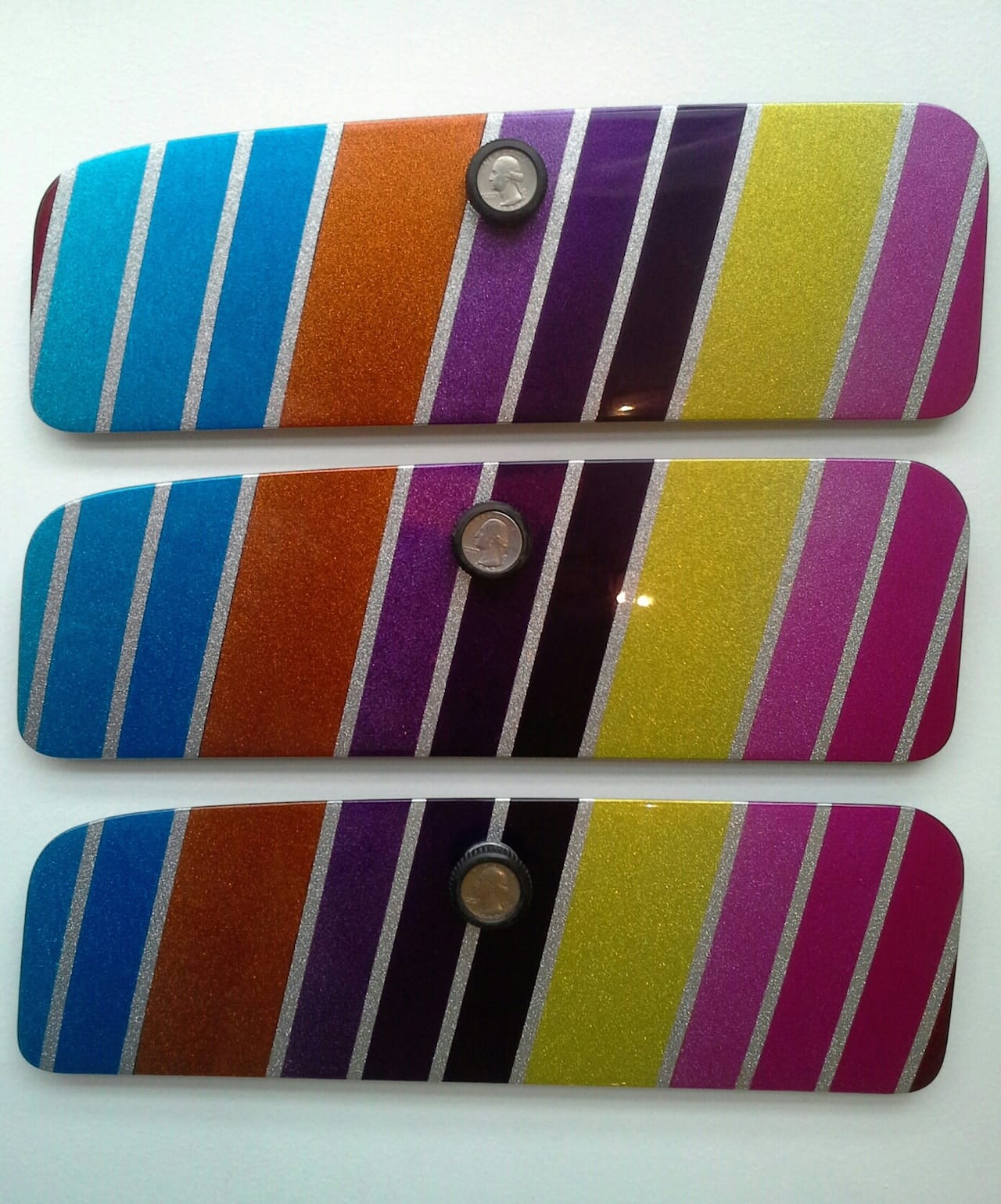 Simon Emery paintings on VW Beetle glove box covers (image courtesy the artist)