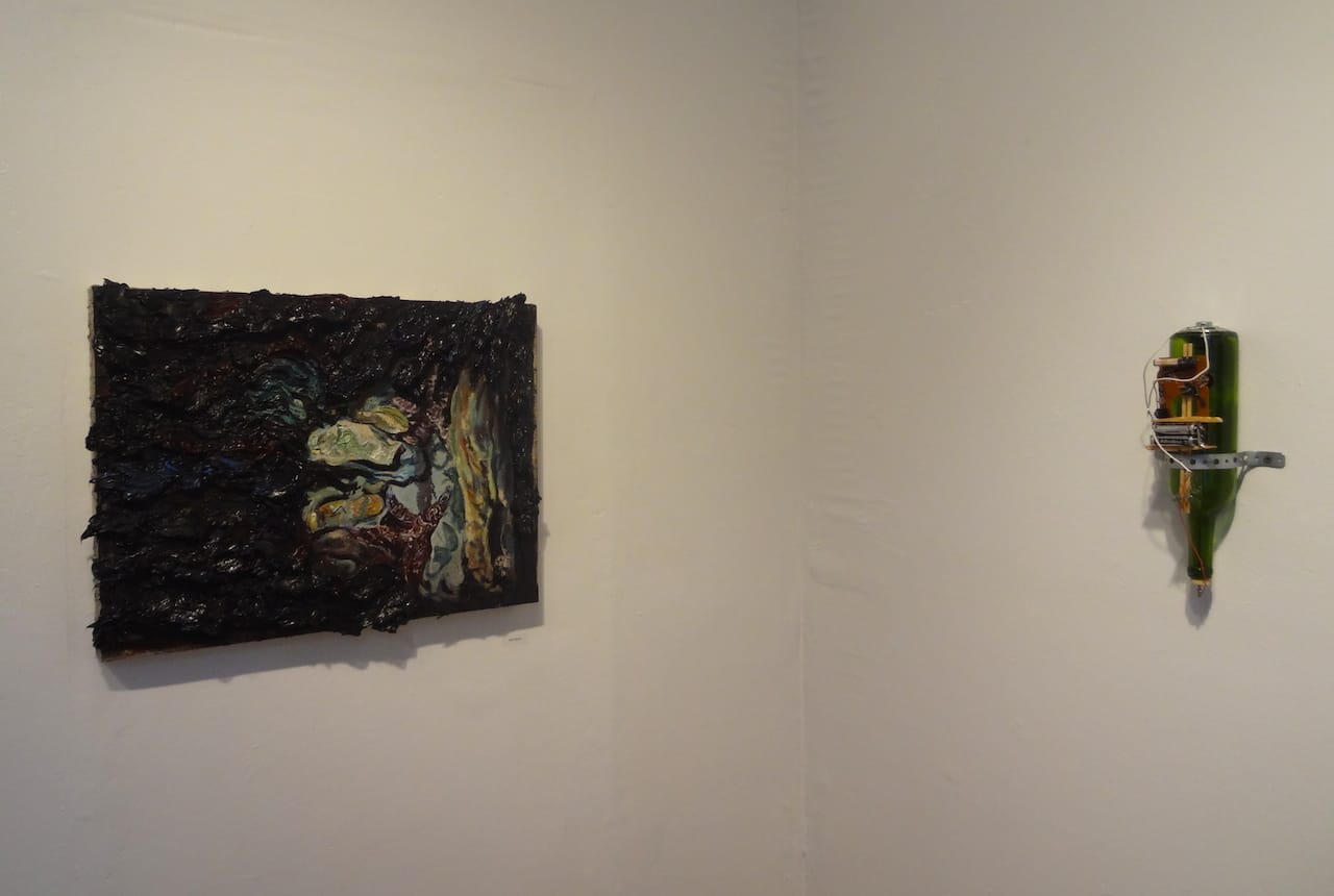 Nick Brown's "The Wall" (2013, at left) and Kio Griffith's "White Elephant Fukushima Daiichi No.4 Reactor" (2013, right), presented by Durden and Ray at Norte Maar