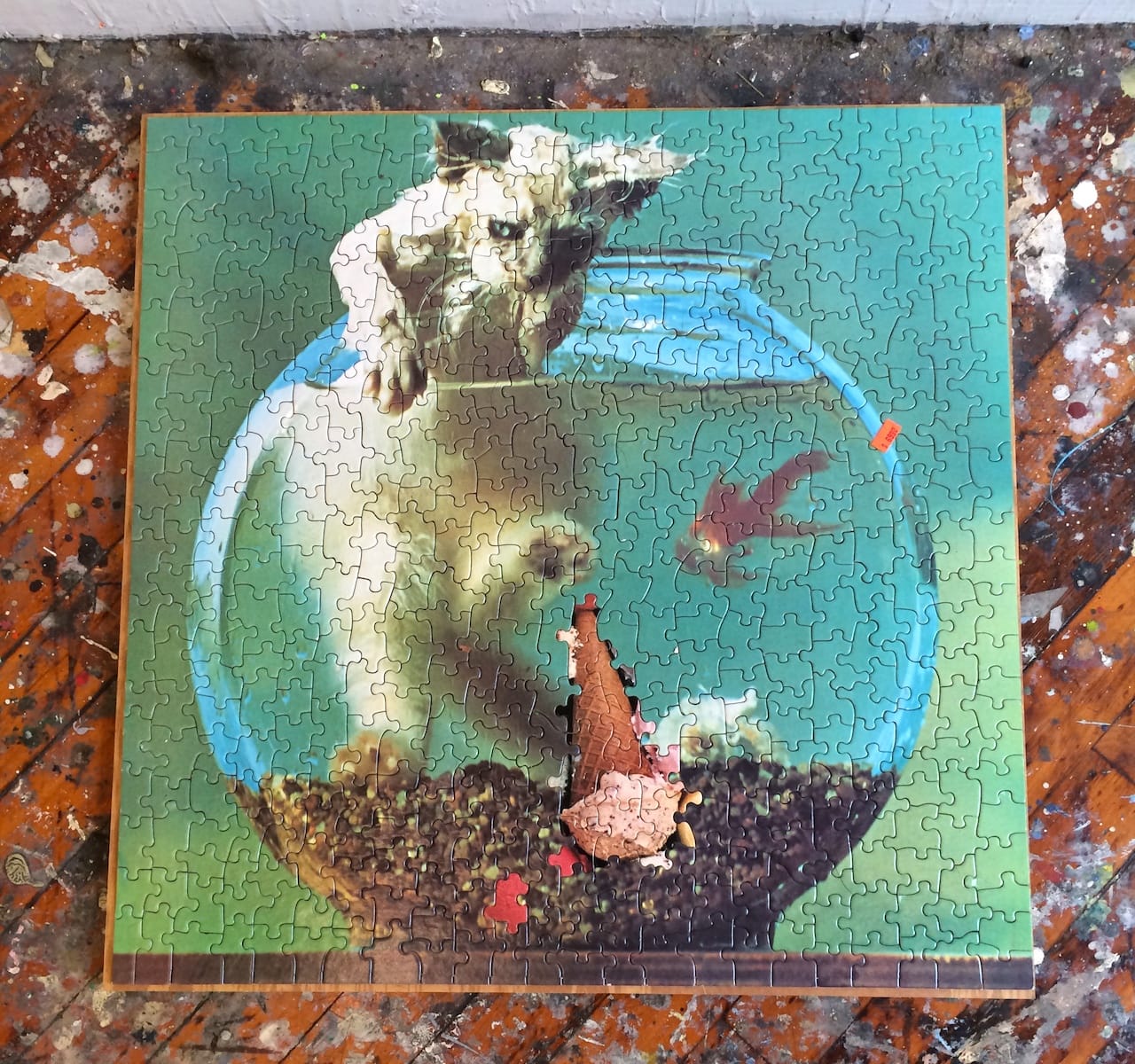 A jigsaw puzzle in Rachel Schmidhofer's studio combining pieces from two unrelated puzzles