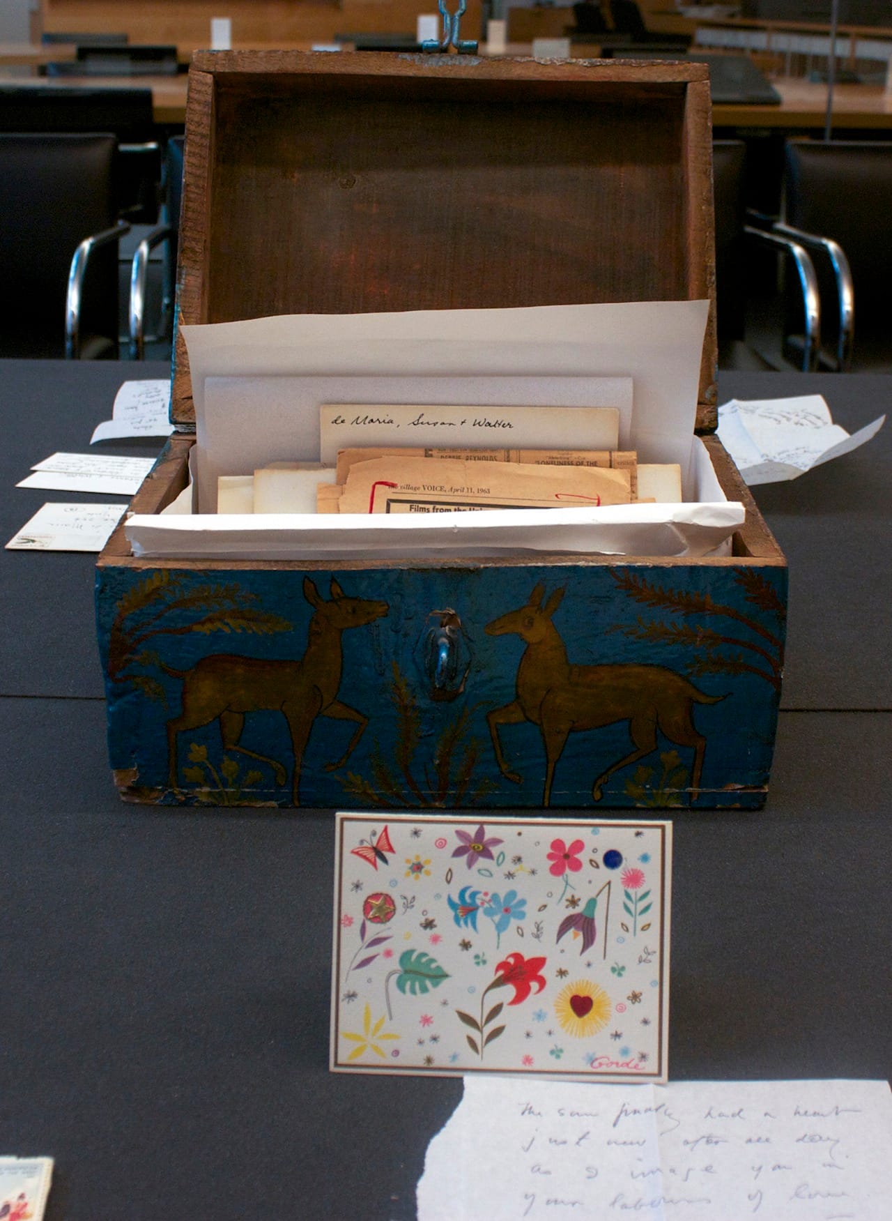 Joseph Cornell saw this wooden box in a Manhattan flea market and gave Susanna De Maria Wilson the money to purchase. It holds his correspondence, and in front of the box is a card dated March 20, 1963. (Image courtesy of the Getty Research Institute, Los Angeles)