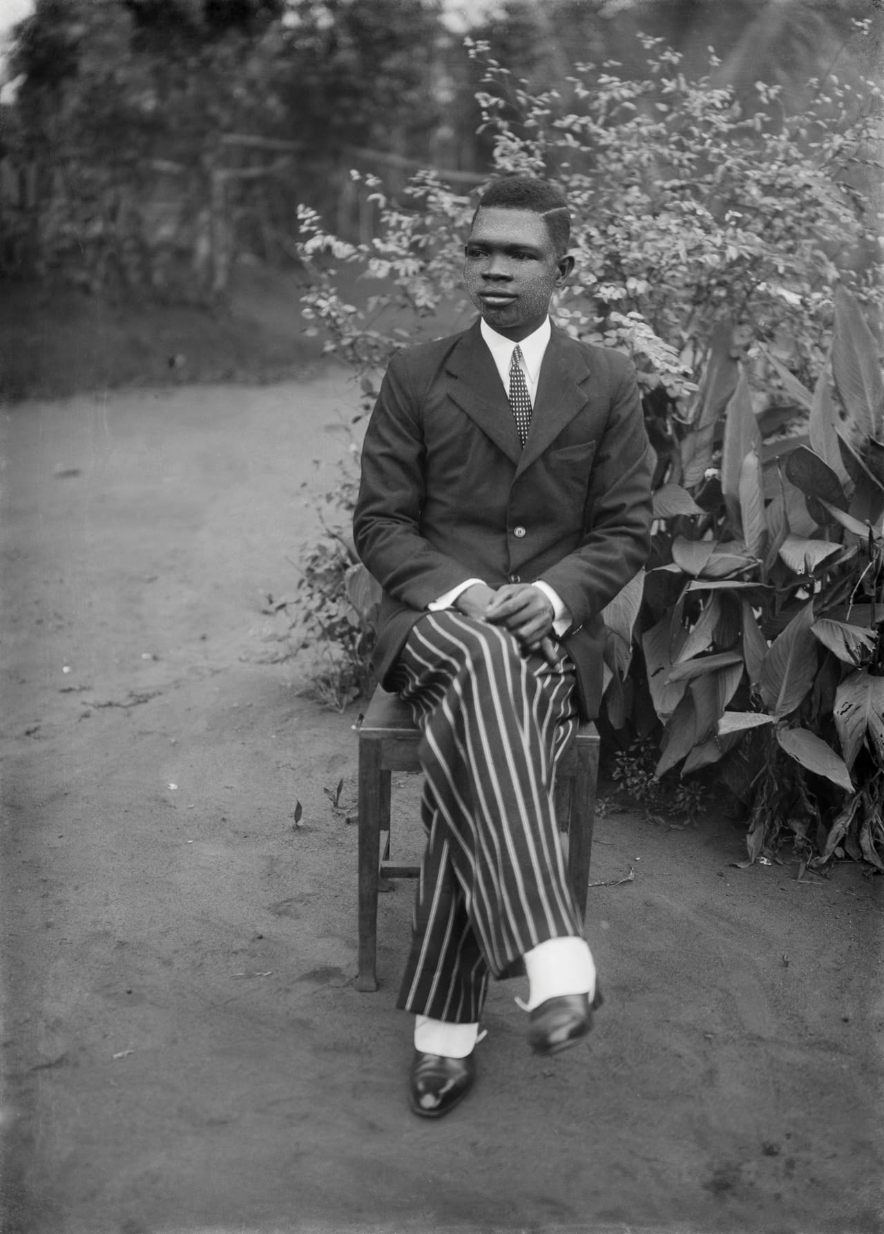 Alonge - self-portrait - seated, c. 1942, Chief S.O. Alonge: Photographer to the Royal Court of Benin, Nigeria