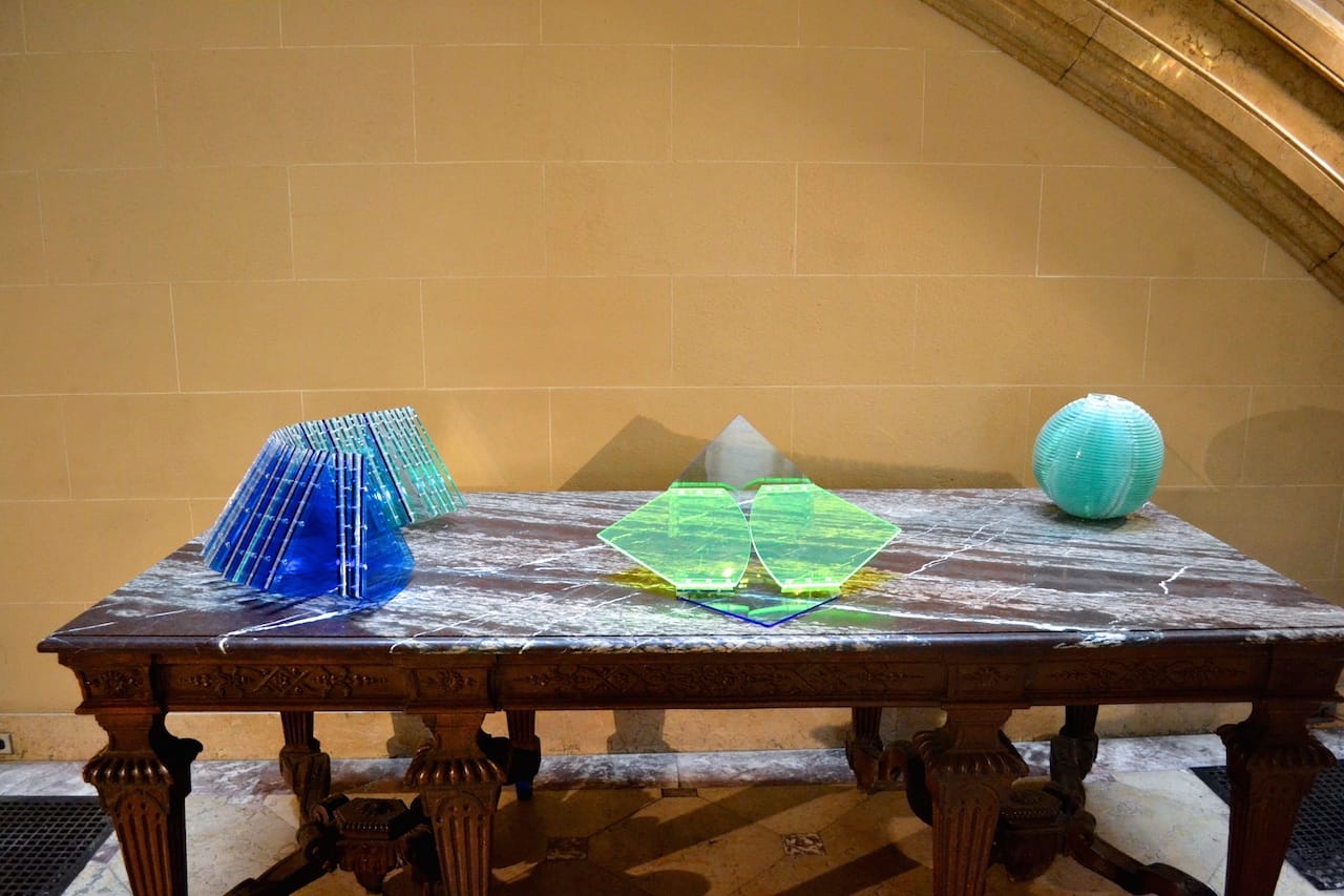 From left: Marta Chilindron “Helix” (2011), acrylic, dimensions variable, closed: 9 ½ x 11 x 25 in; “Convertible Circle” (2009-2014), acrylic, dimensions variable, diameter: 24 in; “Sphere” (2008), acrylic, dimensions variable, diameter: 12 in