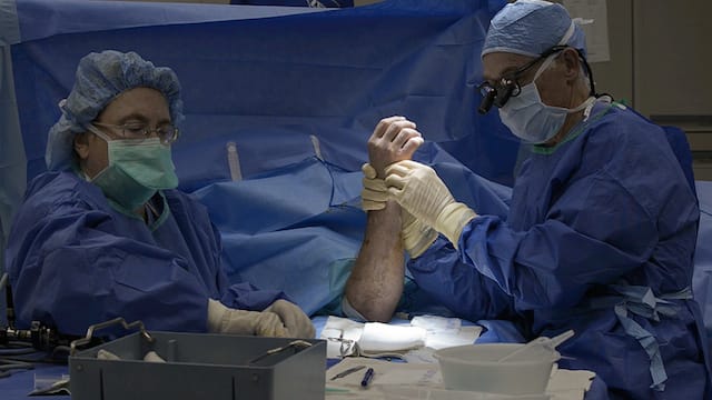 Paul Foley, Hand Out, Boston 2013, video still. (photo courtesy Mills Gallery, Boston Center for the Arts)