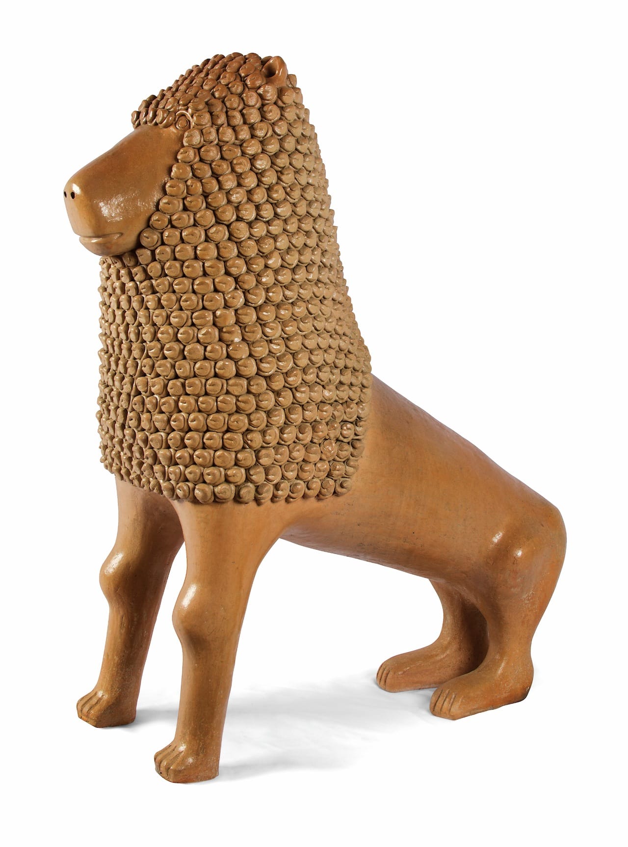 . Manoel Gomes Da Silva "Nuca." Lion, 2011. Modeled clay, smoothed, with appliqué and varnished. Tracunhaém, Pernambuco,  Brazil. Coll. Fomento Cultural Banamex, A.C. Image Courtesy of Fomento Cultural Banamex, A.C.