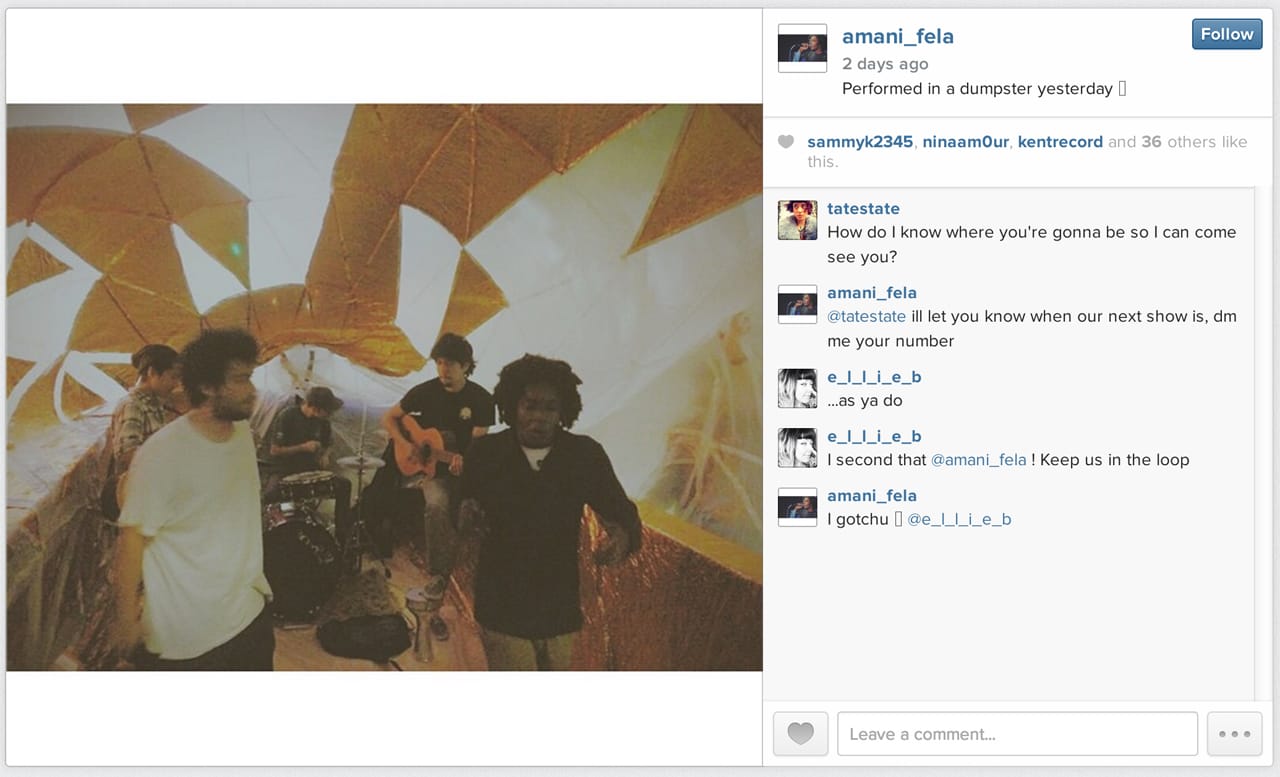 Amani Fela performing inside the Inflato Dumpster