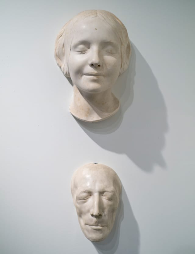 Two Death Masks; top mask from the collection of Evan Michelson; bottom mask from the collection of Mike Zohn