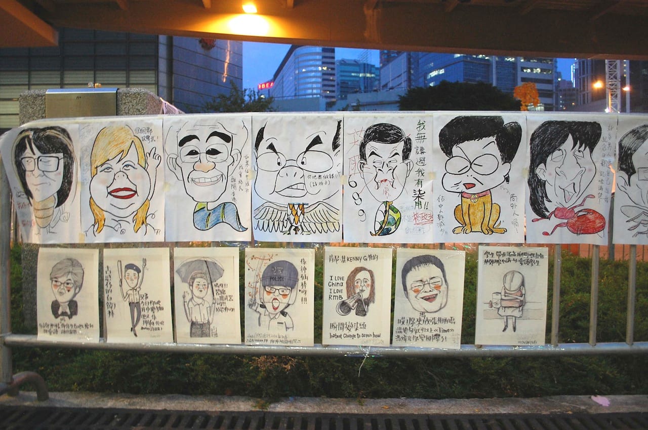 Caricatures of pro-establishment figures in Hong Kong (Image via Wikimedia) 