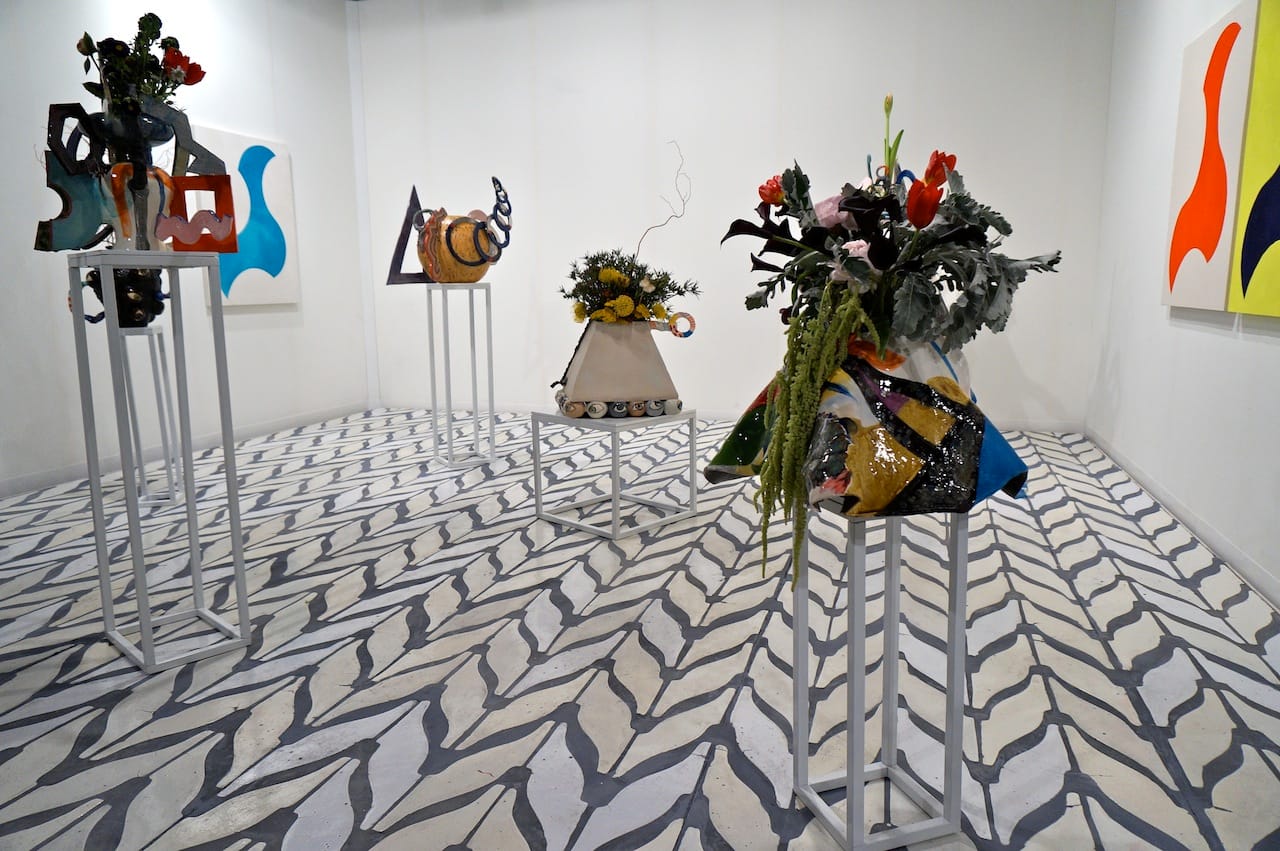 Travesia Cuatro's booth, filled with work by 