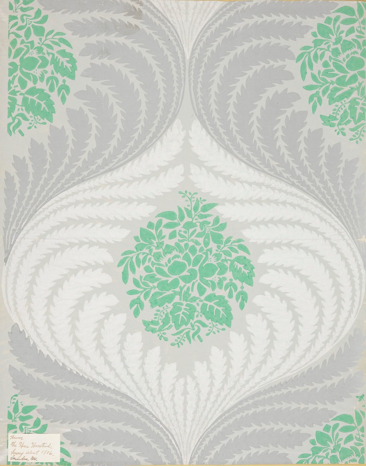 This French wallpaper was manufactured by Zuber et Cie between 1830 and 1831. It was printed in gray, green, and white on a polished green background and features leaves framing floral medallions.