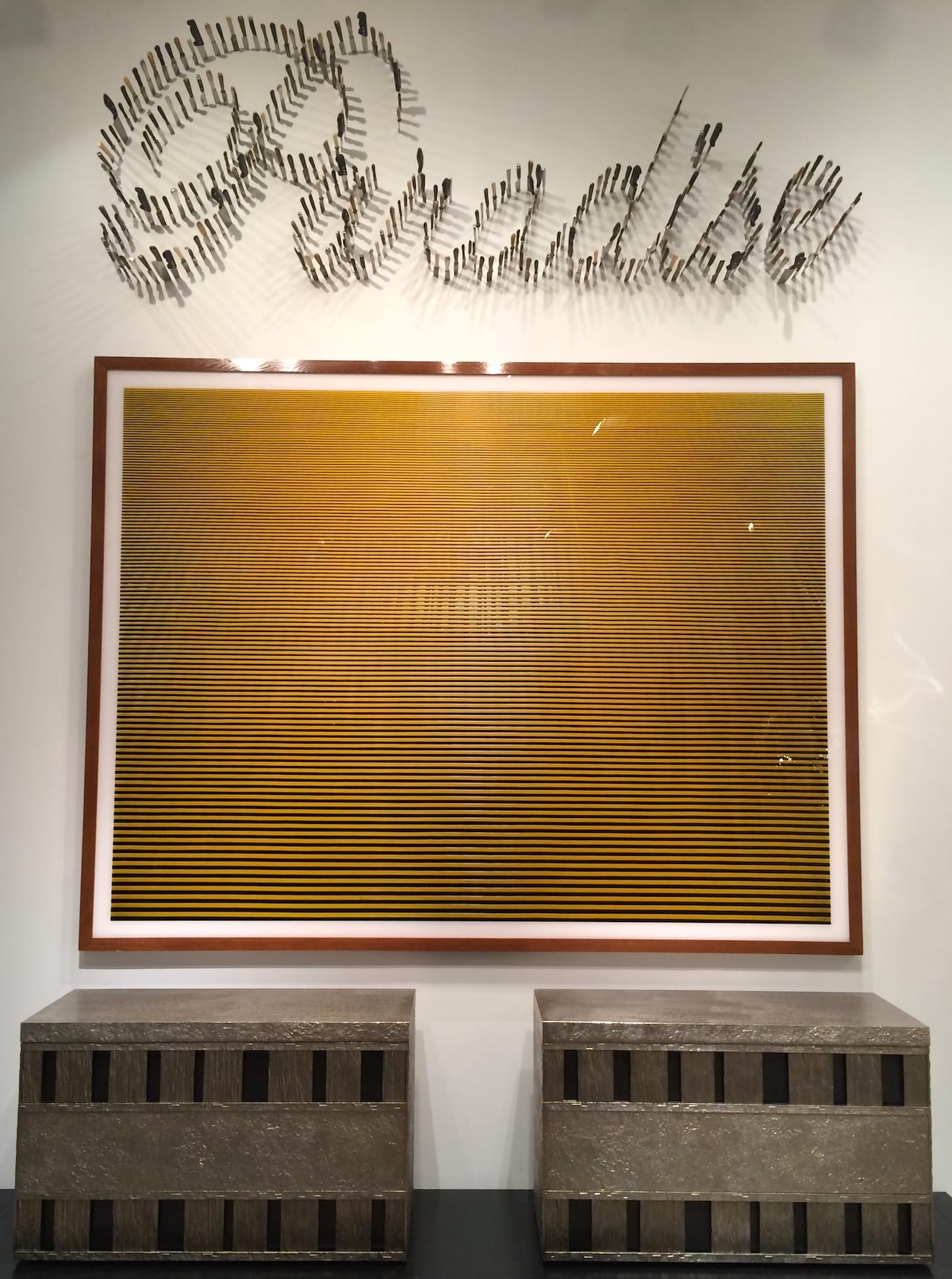 Installation view of 'One Way: Peter Marino' with, from top to bottom, works by Farhad Moshiri, Andreas Gursky, and Peter Marino