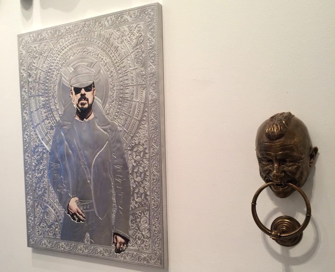 Wim Delvoye's "Icon (Peter Marino)" (2013) and "Door Knocker (Peter Marino)" (2014) in 'One Way: Peter Marino' at the Bass Museum of Art