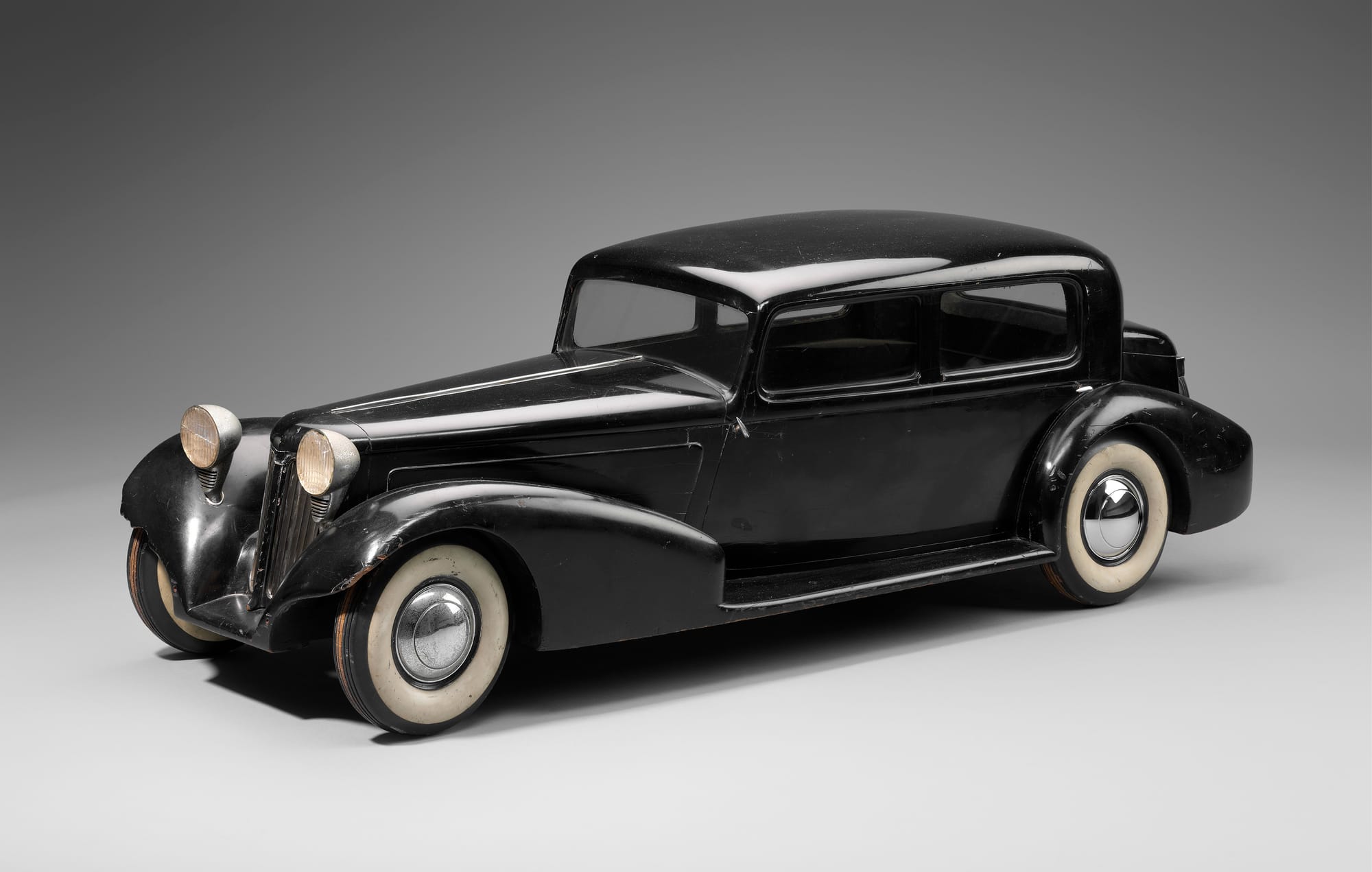 1934 LaSalle design model United States (Detroit) designed and made by Harley J. Earl (American, 1893–1969) for General Motors Corporation about 1933; Mahogany, painted black, chrome-plated metal, glass (Jean S. and Frederic A. Sharf Collection; Courtesy, Museum of Fine Arts, Boston)