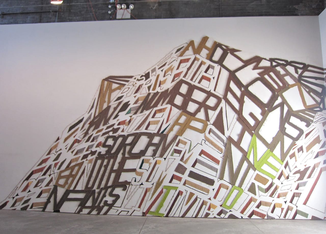 Linda Herritt, “Terra Infirma,” 2014, Fabric, foam, tape, yarn, plastic, and wood, approx. 16 x 50 feet