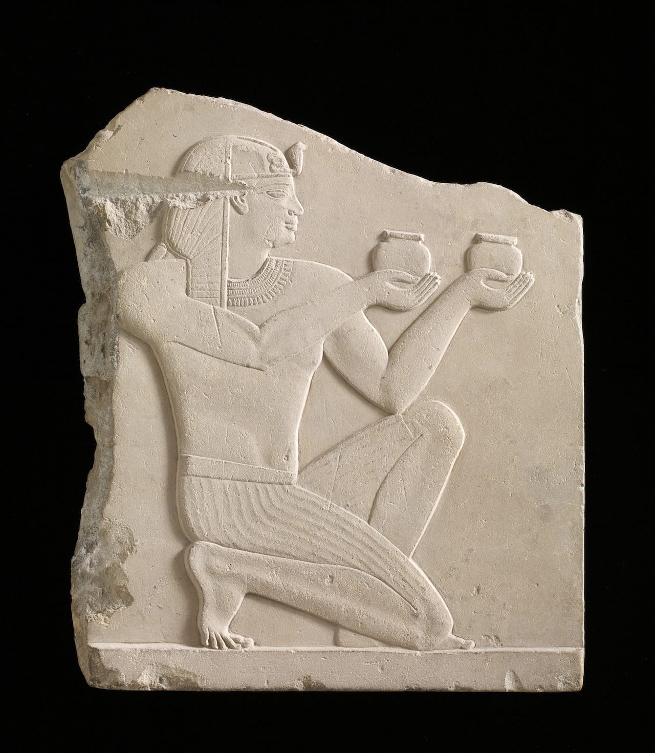 "Plaque depicting a king offering wine" (305–30 BCE), Egypt, possibly Ptolemaic dynasty, soft limestone, Gift of Charles Lang Freer, Freer Gallery of Art