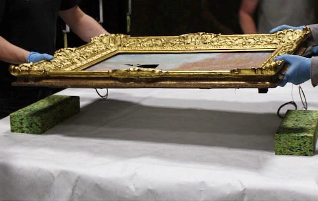 Before it was moved from the exhibition space, conservators examined the painting for signs of loose paint and flaking, securing any loose fragments temporarily. As a result of the impact sustained by the painting, tiny fragments of paint and ground came loose and were deposited on the painting’s surface or on the ground nearby. These fragments were carefully collected and stored for later reinsertion. The painting was removed from public display and taken into the conservation studio for treatment. It was laid flat and stabilised from the front and back. Conservators removed the painting from its frame and documented any changes to the condition of the object.(Image courtesy of'National Gallery of Ireland) 